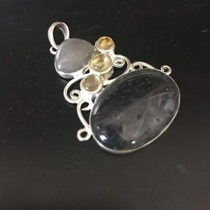 Sterling silver pendant w/ onyx and citrine stone.